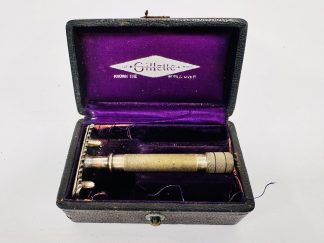 Lote #010 - Antigua Gillette de metal en su caja original de cuero - 9,5x5,5x4cm