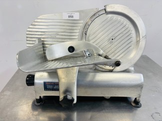 Lote #058 - Maquina de cortar fiambres  con hoja de 25cm