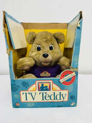 Lote #047 - Oso Tv Teddy interactivo con caja y transmisor - año 1990 - 32cm