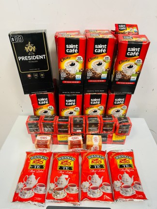 Lote #001 - 14 cajas de café instantaneo (cada una contiene 100 unidades) más 13  cajas de té, más té negro suelto