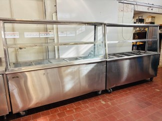 Lote #089 - Dos bufeteras de calientes rodantes en Ac/Inox ¨CUDER¨ (detalles estéticos a la vista, uno tiene 1 vidrio lateral roto, y el otro le falta el vidrio frontal) no tienen las cubas - 183x75x170cm